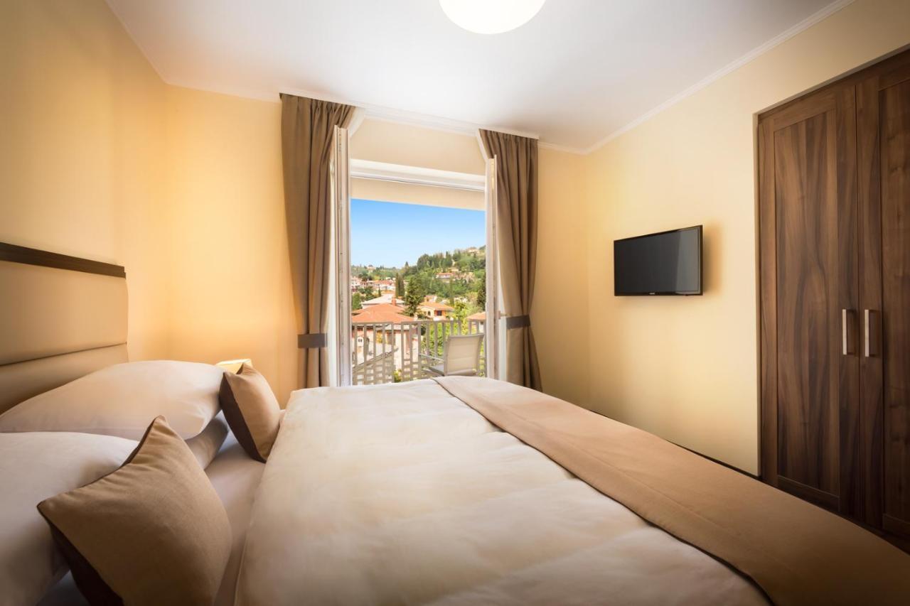 Remisens Casa Rosa - Hotel Metropol Annexe Portorož Quarto foto